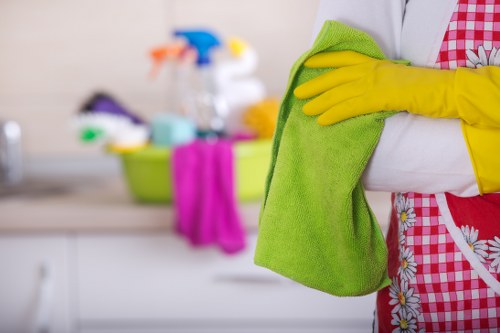 Professional office cleaning crew maintaining desks and shared areas